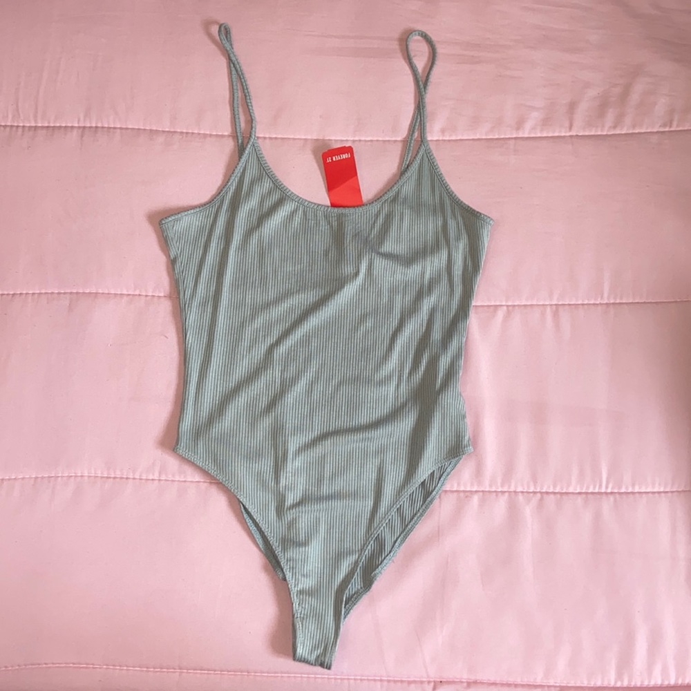 Never worn body suit